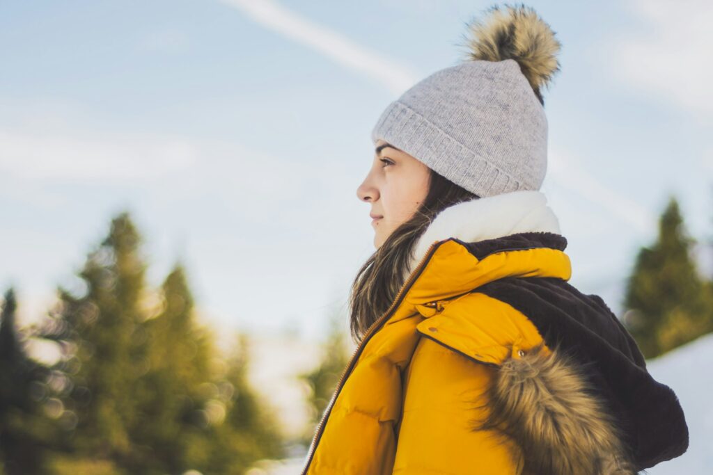 woman standing in the snow