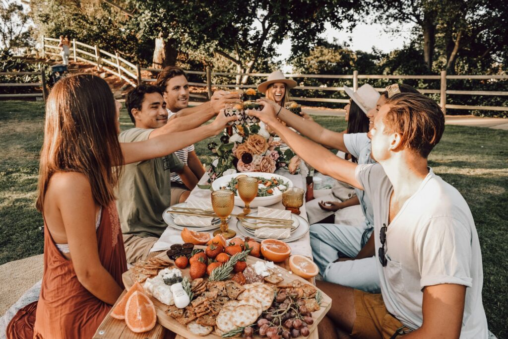 friends cheersing at dinner party